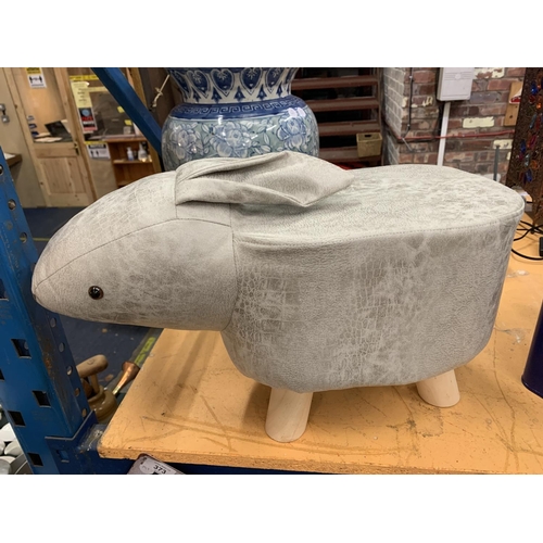 395 - A FAUX SUEDE 'RABBIT' FOOTSTOOL - H:29CM  L:54CM