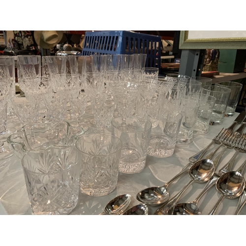 399 - A LARGE QUANTITY OF CUT GLASS TO INCLUDE SHERRY AND PORT GLASSES AND CHAMPAGNE FLUTES