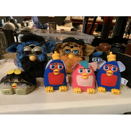 447 - SEVEN COLLECTABLE 'FURBIES' AND AN ASSORTMENT OF MODEL CARS