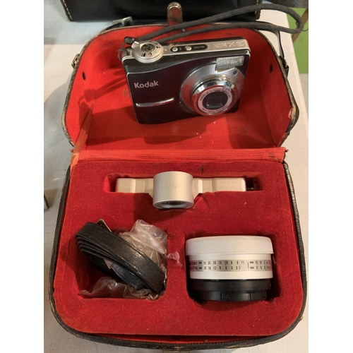 466 - A VINTAGE EUMIGETTE 2 CINE CAMERA WITH CASE AND A KODAK OPTICAL ZOOM DIGITAL CAMERA AND A KALIGAR LE... 