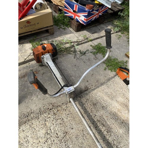 1698 - A STHIL PETROL GRASS STRIMMER BELIEVED IN WORKING ORDER BUT NO WARRANTY