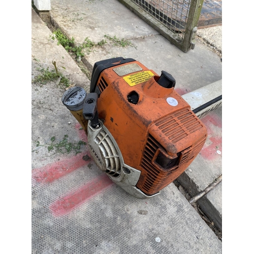 1700 - A STHIL PETROL GRASS STRIMMER BELIEVED IN WORKING ORDER BUT NO WARRANTY