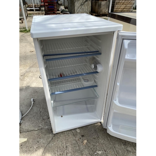 1742 - A WHITE WHIRLPOOL UNDER COUNTER FRIDGE BELIEVED IN WORKING ORDER BUT NO WARRANTY