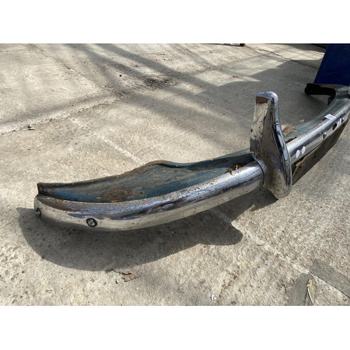 1753 - A CHROME CAR BUMPER BELIEVED TO BE FROM A MORRIS MINOR