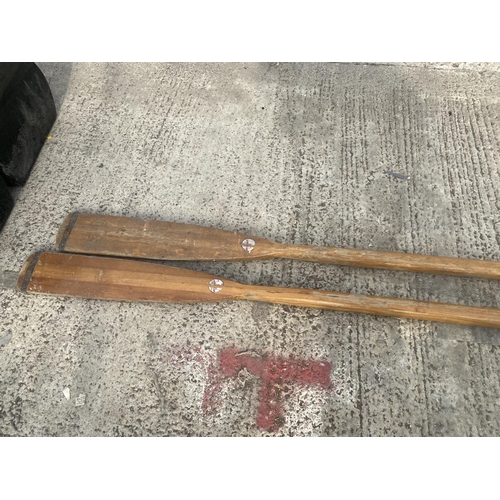 1768 - A PAIR OF WOODEN BOAT OARS