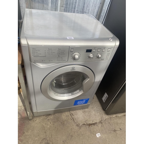 1852 - A SILVER INDESIT WASHING MACHINE BELIEVED IN WORKING ORDER BUT NO WARRANTY