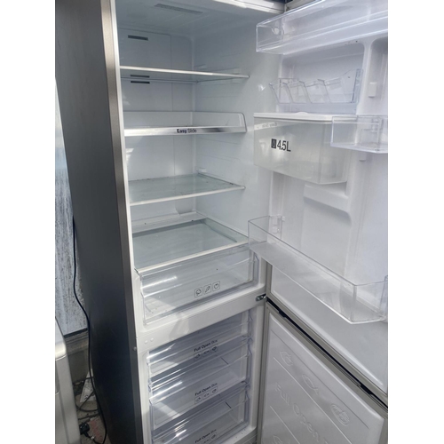 1853 - A SAMSUNG UPRIGHT FRIDGE FREEZER BELIEVED IN WORKING ORDER BUT NO WARRANTY