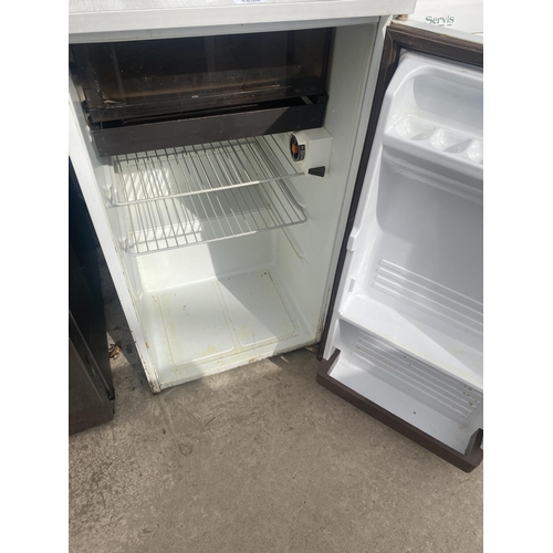 1854 - A WHITE SIERA UNDER COUNTER FRIDGE BELIEVED IN WORKING ORDER BUT NO WARRANTY