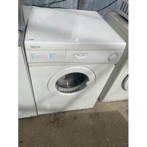 1856 - A WHITE SERVIS TUMBLE DRYER BELIEVED IN WORKING ORDER BUT NO WARRANTY