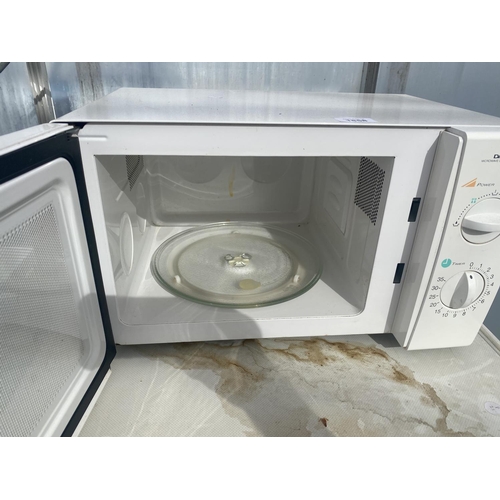 1858 - A WHITE DAEWOO MICROWAVE OVEN BELIEVED IN WORKING ORDER BUT NO WARRANTY