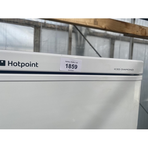 1859 - A WHITE HOTPOINT UPRIGHT FRIDGE FREEZER BELIEVED IN WORKING ORDER BUT NO WARRANTY