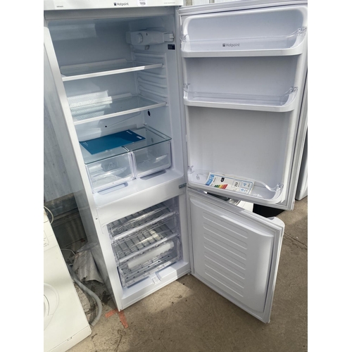 1859 - A WHITE HOTPOINT UPRIGHT FRIDGE FREEZER BELIEVED IN WORKING ORDER BUT NO WARRANTY