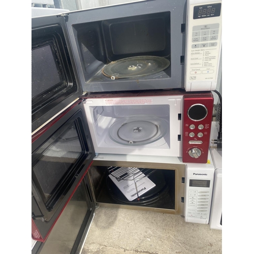 1864 - THREE MICROWAVE OVENS TO INCLUDE TWO PANASONIC AND A MORPHY RICHARDS BELIEVED IN WORKING ORDER BUT N... 