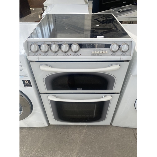 1874 - A WHITE CONCEPT ELECTRIC OVEN AND HOB BELIEVED IN WORKING ORDER BUT NO WARRANTY