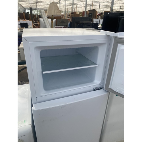 1877 - A WHITE FRIDGEMASTER UPRIGHT FRIDGE FREEZER BELIEVED IN WORKING ORDER BUT NO WARRANTY