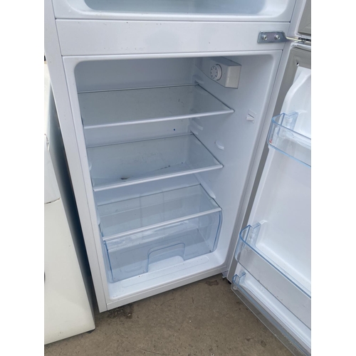 1877 - A WHITE FRIDGEMASTER UPRIGHT FRIDGE FREEZER BELIEVED IN WORKING ORDER BUT NO WARRANTY