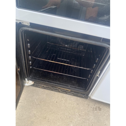 1887 - A WHITE FLAVEL OVEN AND HOB BELIEVED IN WORKING ORDER BUT NO WARRANTY