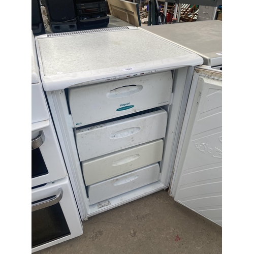 1889 - A WHITE HOTPOINT UNDER COUNTER FREEZER BELIEVED IN WORKING ORDER BUT NO WARRANTY