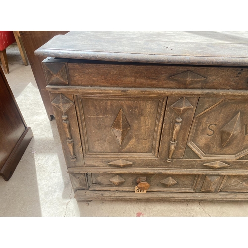 2118 - A GEORGE III OAK BLANKET CHEST WITH THREE PANEL FRONT BEARING INITIALS S.W AND DRAWER TO BASE, 50