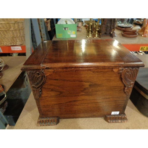 814 - A LARGE VINTAGE STAINED OAK LIDDED BOX WITH HANDLES AND CARVED DETAIL 47CM X 35CM X 35CM