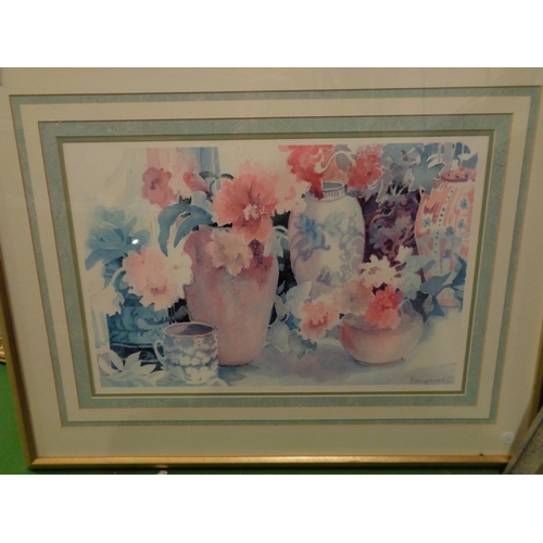 831 - A LARGE SIGNED GILT FRAMED FLORAL STILL LIFE PRINT