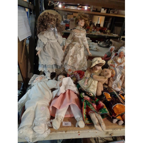 841 - A LARGE COLLECTION OF DECORATIVE DOLLS OF VARIOUS NATIONALITIES