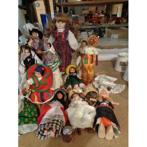 841 - A LARGE COLLECTION OF DECORATIVE DOLLS OF VARIOUS NATIONALITIES