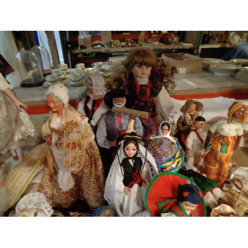 841 - A LARGE COLLECTION OF DECORATIVE DOLLS OF VARIOUS NATIONALITIES