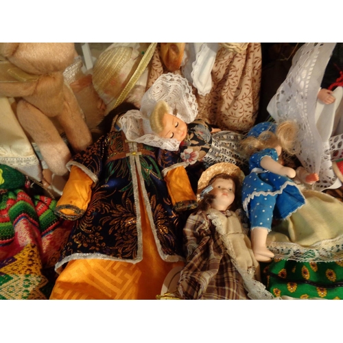 841 - A LARGE COLLECTION OF DECORATIVE DOLLS OF VARIOUS NATIONALITIES