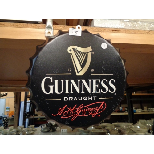 857 - A TIN METAL 'GUINESS' BOTTLE TOP SIGN