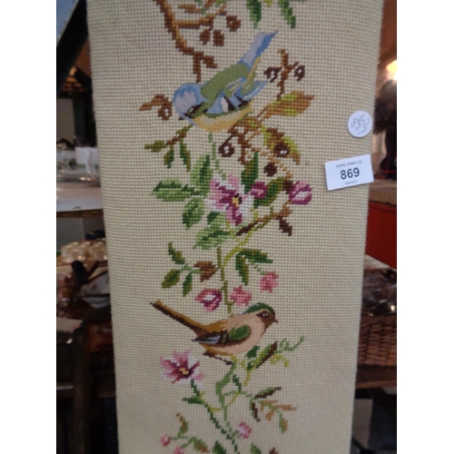 869 - A TAPESTRY WALL HANGING WITH DECORATIVE BRASS DETAIL DEPICTING BRITISH GARDEN BIRDS