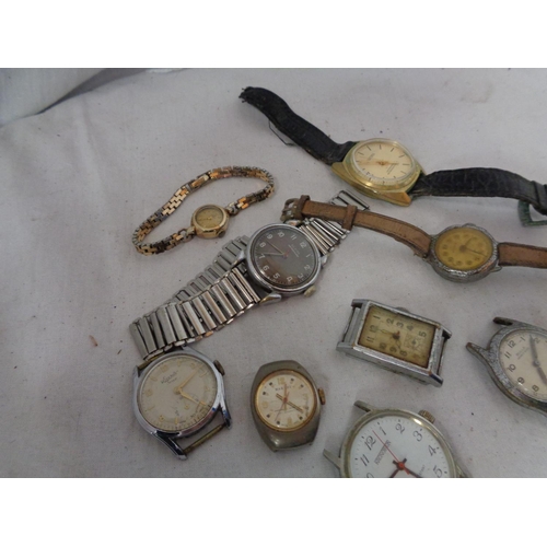 873 - NINE VINTAGE WATCH FACES TO INCLUDE FOUR WITH STRAPS