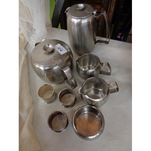 874 - A GROUP OF STAINLESS STEEL TEA AND COFFEE ITEMS TO ALSO INCLUDE THREE SILVER PLATED NAPKIN RINGS