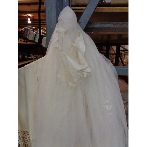 875 - A VINTAGE SATIN WEDDING GOWN, A SILK FRINGED WEDDING SHAWL, TWO LACE VEILS, A VINTAGE BEADED BAG AND... 