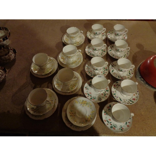 886 - AN ASSORTMENT OF DUCHESS 'LABURNUM' AND ROYAL STAFFORD TEA WARE