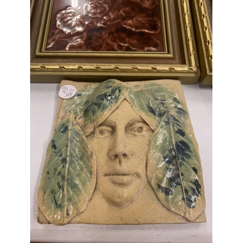 245 - A PAIR OF FRAMED CERAMIC TILES AND A PAIR OF HAND CRAFTED TILES WITH GLAZED LEAF DETAIL