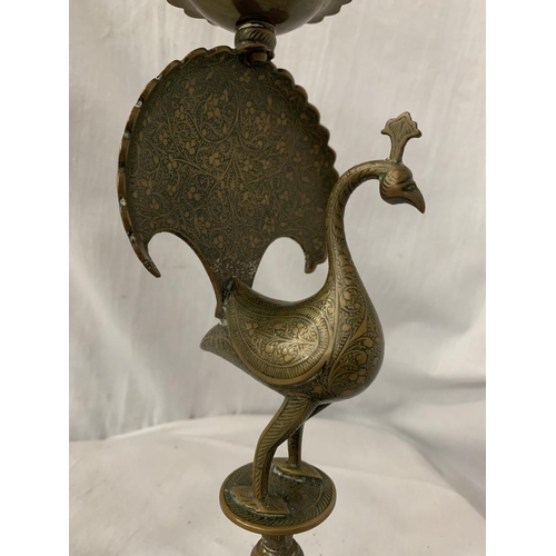 7 - A PAIR OF BRASS CANDLESTICKS IN THE FORM OF PEACOCKS H: 31CM