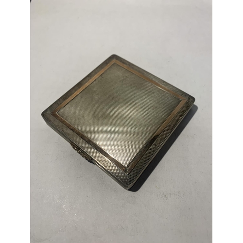 796 - A MARKED SILVER POWDER COMPACT