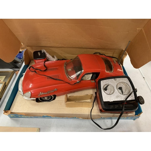 260 - A VINTAGE TOPPER TOYS JOHNNY SPEED E-TYPE JAGUAR MODEL CAR TO INCLUDE THE ORIGINAL DRIVER AND BOX AN... 