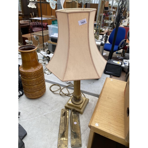 1925 - A GILT TABLE LAMP AND A PAIR OF BRASS PUSH PLATES