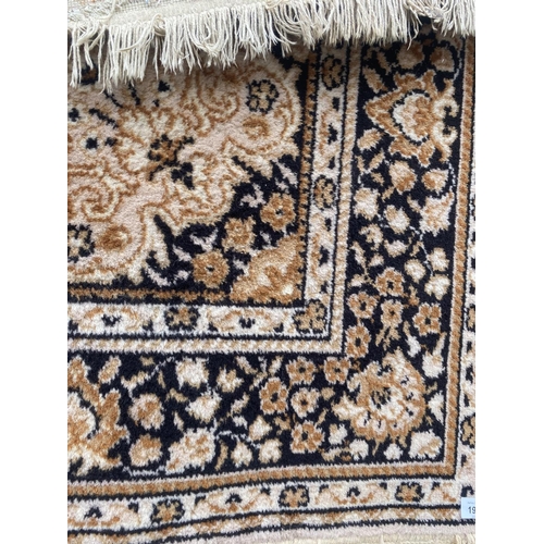 1992 - A BROWN PATTERNED RUG