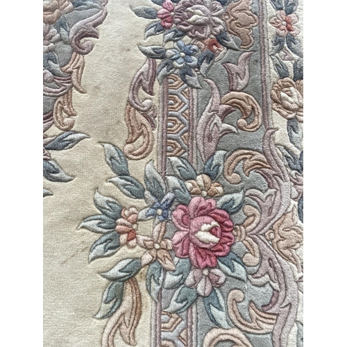 1997 - A GREEN PATTERNED RUG