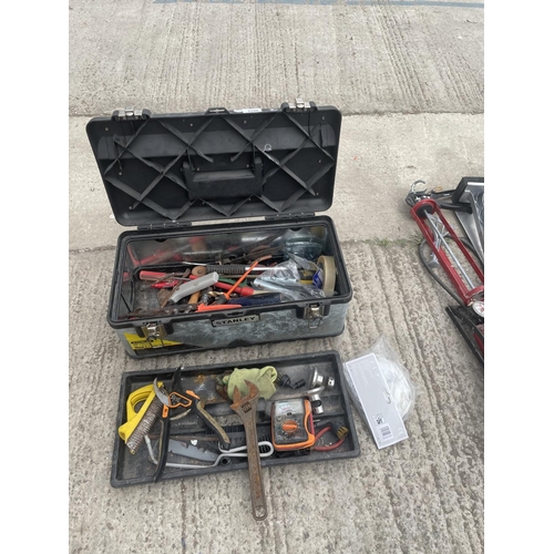 1786 - A TOOL BOX CONTAINING VARIOUS TOOLS - SPANNERS, SCREWDRIVERS ETC