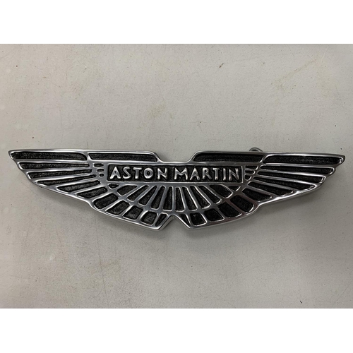 195 - A CAST 'ASTON MARTIN' SIGN