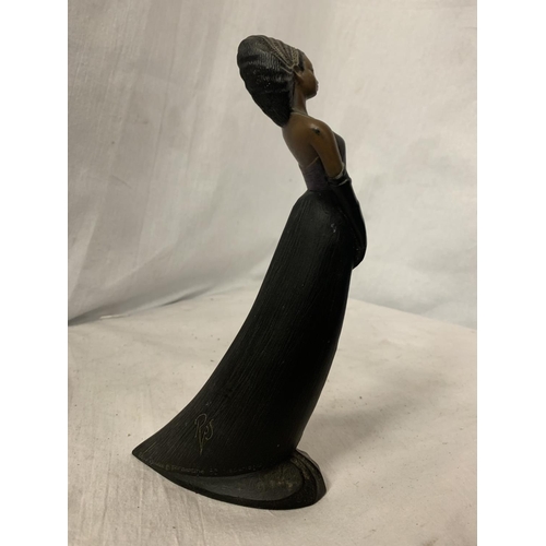 233 - A MONOGRAMMED TRIBAL FIGURINE H:23.5CM