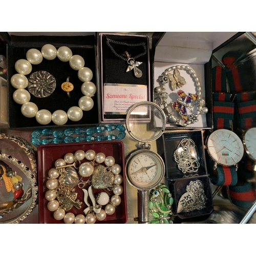 402 - A TIN OF COSTUME JEWELRY INCLUDING A COMPASS ETC