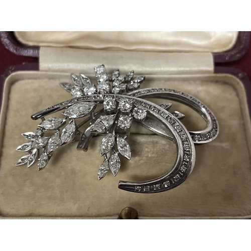 506 - AN 18 CARAT WHITE GOLD BOOCH WITH MARQUISE  AND BRILLIANT CUT DIAMONDS IN A PRESENTATION BOX