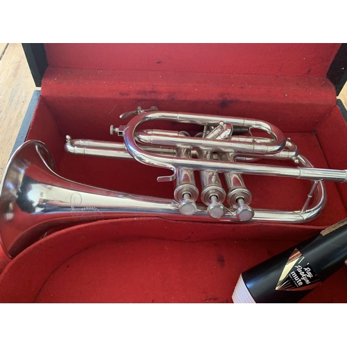 552 - A SILVER PLATED CORNET IN A CASE