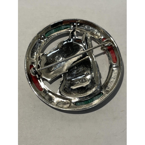 591 - A MARKED SILVER BROOCH WITH RED AND GREEN STONES DEPICTING A TERRIER