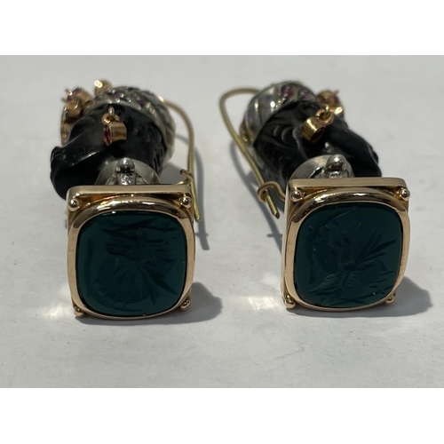 596 - A PAIR OF BLACKAMORE, 14 CARAT GOLD AND EMERALD EARRINGS IN AN A FRICAN BUST DESIGN